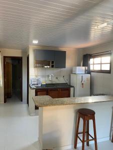 AP33 a 100m da Praia de Taperapuã, Apartamento Aconchegante de 2 Quartos para Até 4 Pessoas!