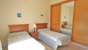 Two Bedroom Apartment with Pool and Sea Views