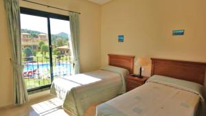 Two Bedroom Apartment with Pool and Sea Views