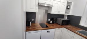 Appartements Le Nid du Voyageur : photos des chambres