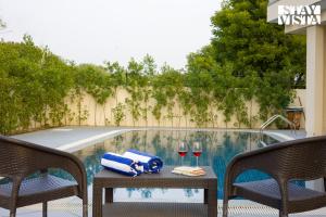 StayVista at Lush Haven with Pool, AC