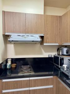 Bayfront Suite in Pasay, Manila Near NAIA Terminal, PICC, Star City, MOA and US Embassy - Pet-Friendly, Free Pool, Wi-Fi & Netflix