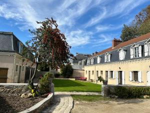 Appartements L-ancienne ferme du chateau : photos des chambres