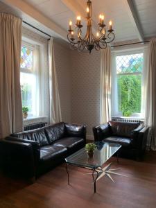 Vernieuwd luxe voorhuis - naast de molens