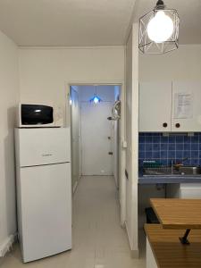 Studio 4 couchages avec piscine dété vue port