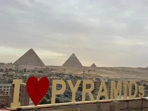 Separate hotel rooms with a view of the pyramids - Kafret Nassar