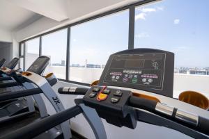 Nivla Executive Cozy haven with gym and Balcony