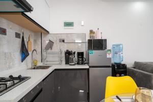 Nivla Executive Cozy haven with gym and Balcony