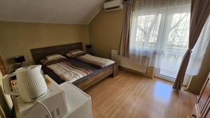 Rózsakert Apartmanház