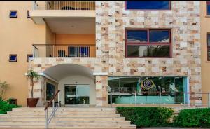 EL FARO 103 SURF ground floor 2 bedroom apt pool view