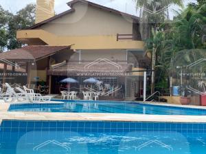 Flat Amarilis em Riviera São Lourenço - com arrumação, café manhã, wifi privat, toalhas praia e piscina e enxoval completo com trocas toalhas