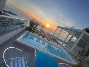 HS-DD Habitación Deluxe cerca al mar con piscina y wifi