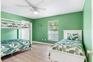 Seabreeze Oasis Lakefront Home has 2 ensuites and heated pool