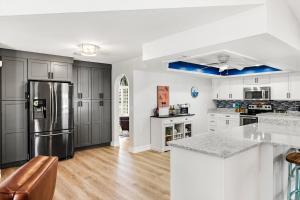 Seabreeze Oasis Lakefront Home has 2 ensuites and heated pool