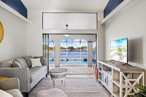 Seabreeze Oasis Lakefront Home has 2 ensuites and heated pool