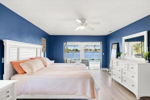 Seabreeze Oasis Lakefront Home has 2 ensuites and heated pool