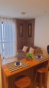 nityloft com piscina e academia em Icaraí