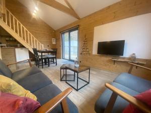 Chalets Chalet muguet & Jaccuzi privatif : photos des chambres