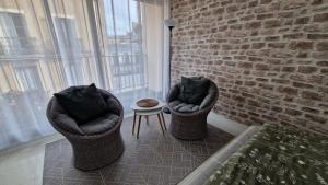 Appartements Appartement centre ville avec parking privatif : photos des chambres