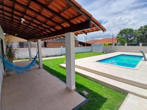 Casa com piscina e ar condicionado perto da Lagoa