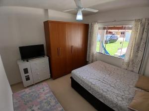 Casa com piscina e ar condicionado perto da Lagoa