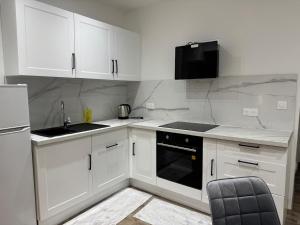 Le Verdoyant , maisonnette cosy avec terrasse totalement climatisé avec parking