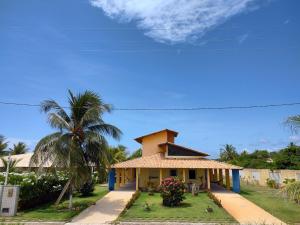 Casa de praia condomínio fechado, frente para o mar