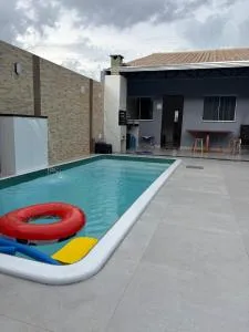 Casa azul com piscina a 15 min do aeroporto - Várzea Grande