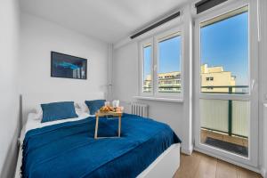 Mokotów Studio - 14th Floor, Balcony - by Rentujemy