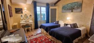 Maisons d'hotes La Bastide des Amouriers : photos des chambres