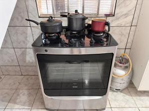 Duplex 3 quartos Ar condicionado 2 camas casal 5 camas solteiro Garagem para 3 carros proximo ao Centro e Shopping