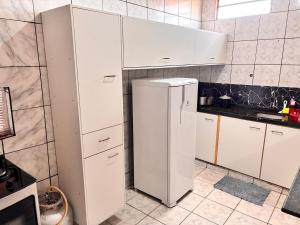 Duplex 3 quartos Ar condicionado 2 camas casal 5 camas solteiro Garagem para 3 carros proximo ao Centro e Shopping