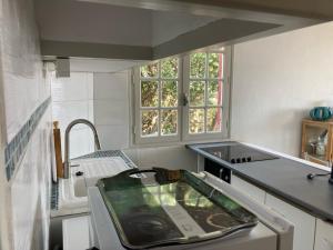Appartements Un Jardin Terrasse sur la Mer : photos des chambres