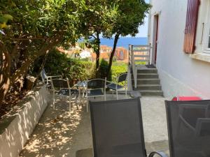 Appartements Un Jardin Terrasse sur la Mer : photos des chambres