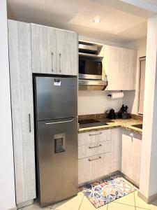 Sunscape Second Floor Condo with Rooftop