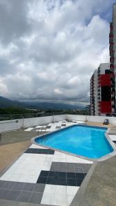 David Cómodo Apartamento con Piscina