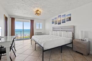 Oceanfront Inn Room #25- Ocean View Balcony King Bed