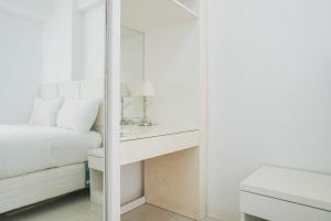 Elegant 2BR at Bassura City Apartment By Travelio