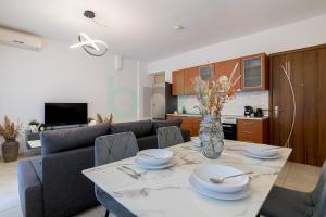 AT Home Apartments A1