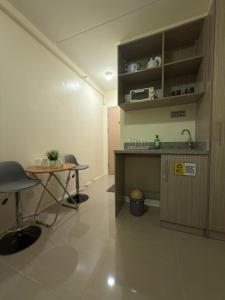 Condo in Cubao by Cindy