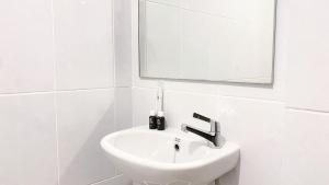 Simple and Tranquil 2BR at Tokyo Riverside PIK 2 Apartment By Travelio