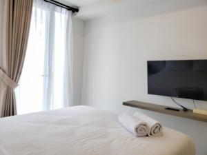 Fancy and Nice Studio at Tokyo Riverside PIK 2 Apartment By Travelio