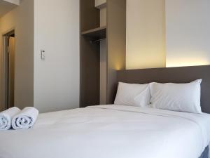 Fancy and Nice Studio at Tokyo Riverside PIK 2 Apartment By Travelio