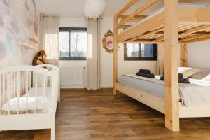 Maisons de vacances Le Loft Black Wood - Piscine prive et grande terrasse a 20 min de Rennes : photos des chambres