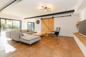 Maisons de vacances Le Loft Black Wood - Piscine prive et grande terrasse a 20 min de Rennes : photos des chambres