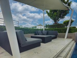1BDR Skypark Laguna 10 min to the Sea Roof Pool