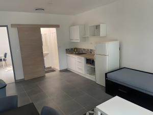 Appartements Appartement B : photos des chambres