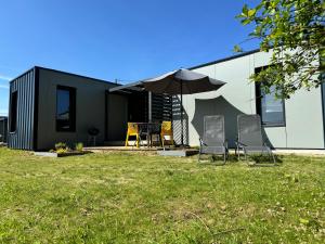 Maisons de vacances Maison A avec air de jeux et jacuzzi : photos des chambres
