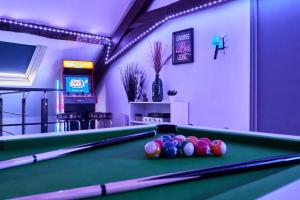 Appartements GameClub - Les Demeures d-Adrien : photos des chambres