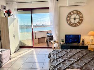 Appartements Voile de Mer 1 - Les Pieds dans l-eau, CLIM, Wifi, 2 personnes : photos des chambres